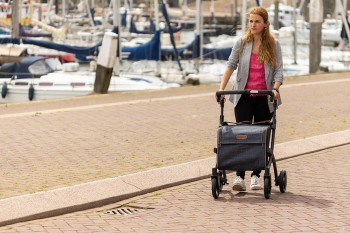 Young girl walking with a Rollz Flex rollator