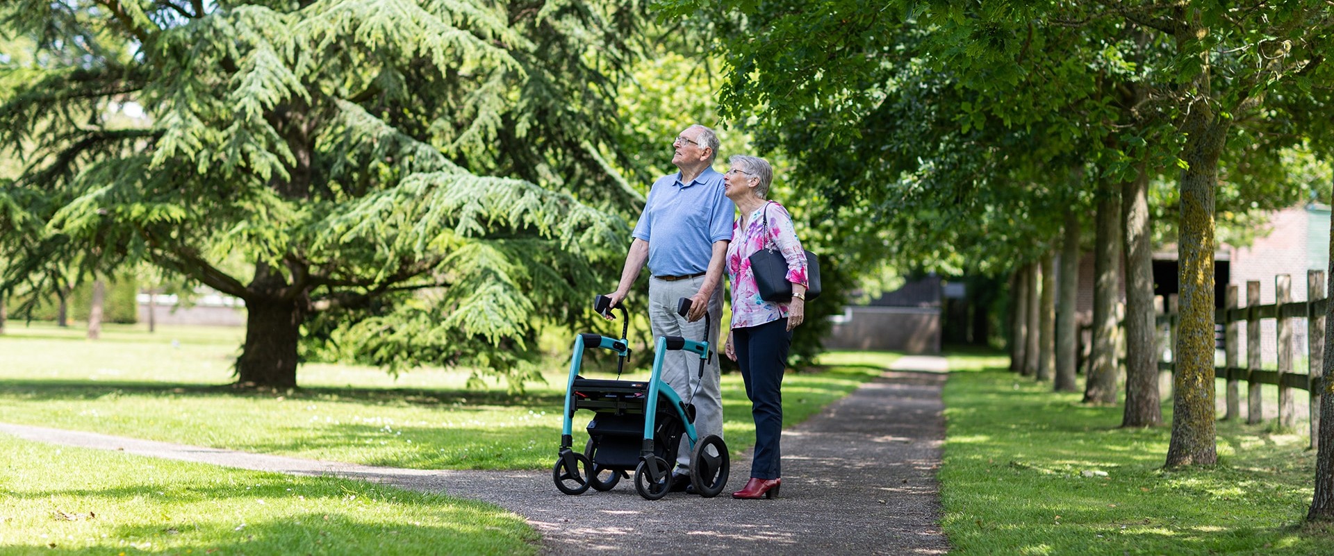 Couple enjoying a day out as one of them uses a Rollz Motion rollator and wheelchair