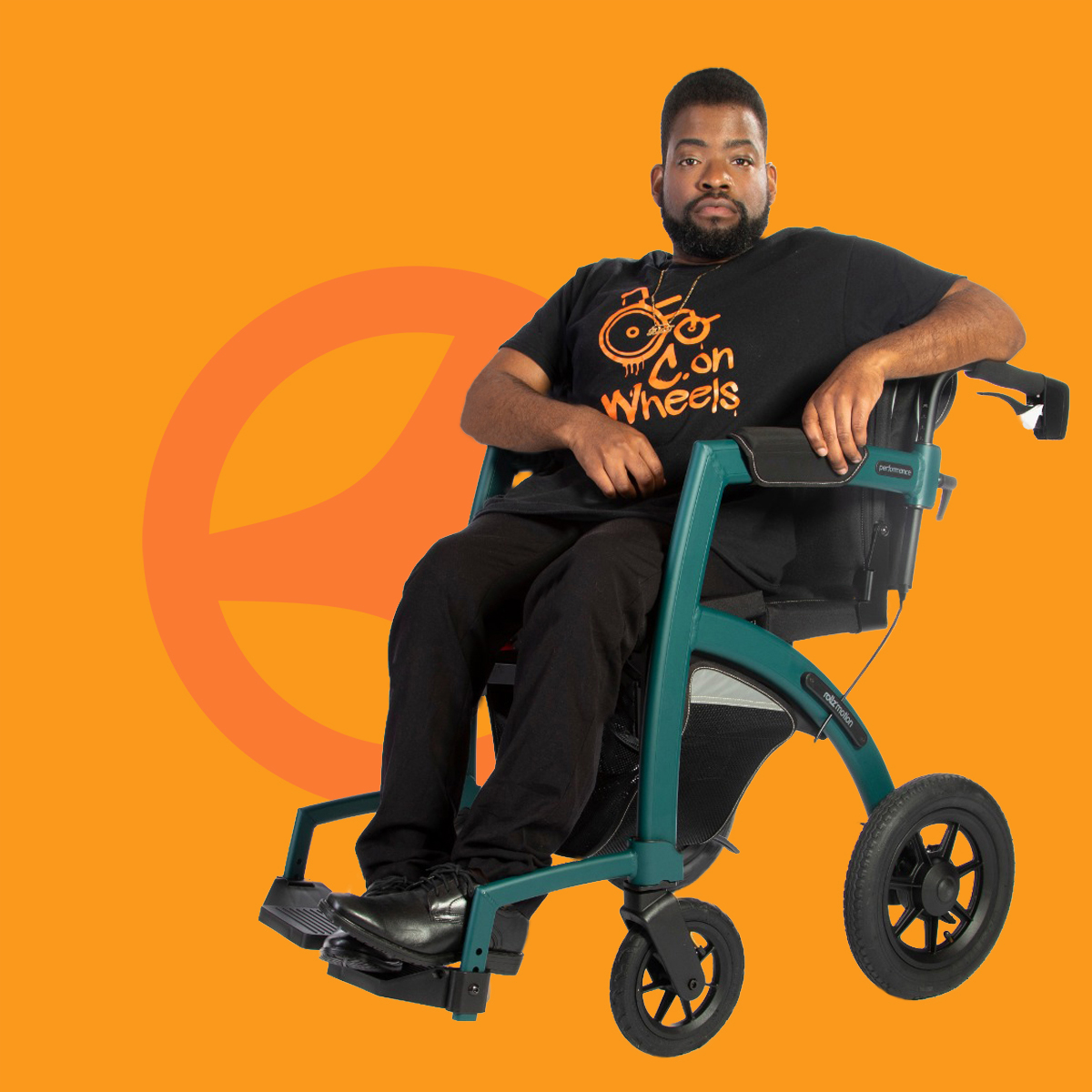 Young man sitting in a comfortable wheelchair