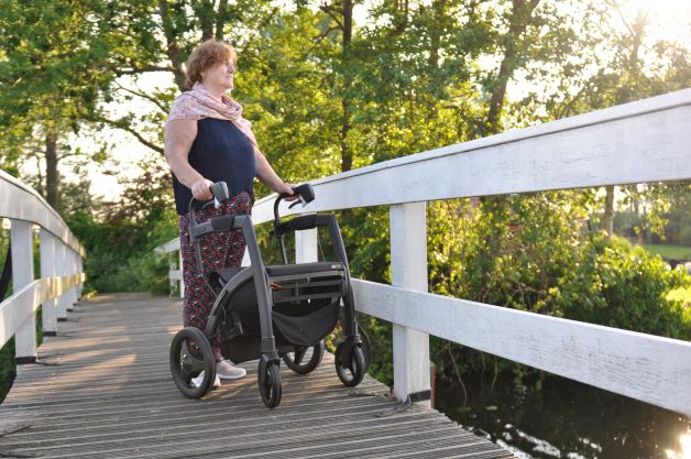 Lady walking with a Rollz Motion Rhythm on a bridge