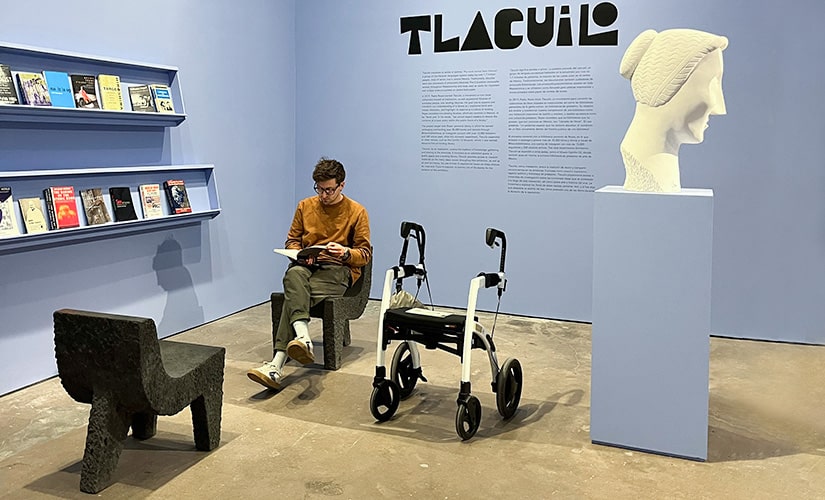 Man using mobility aids in a museu