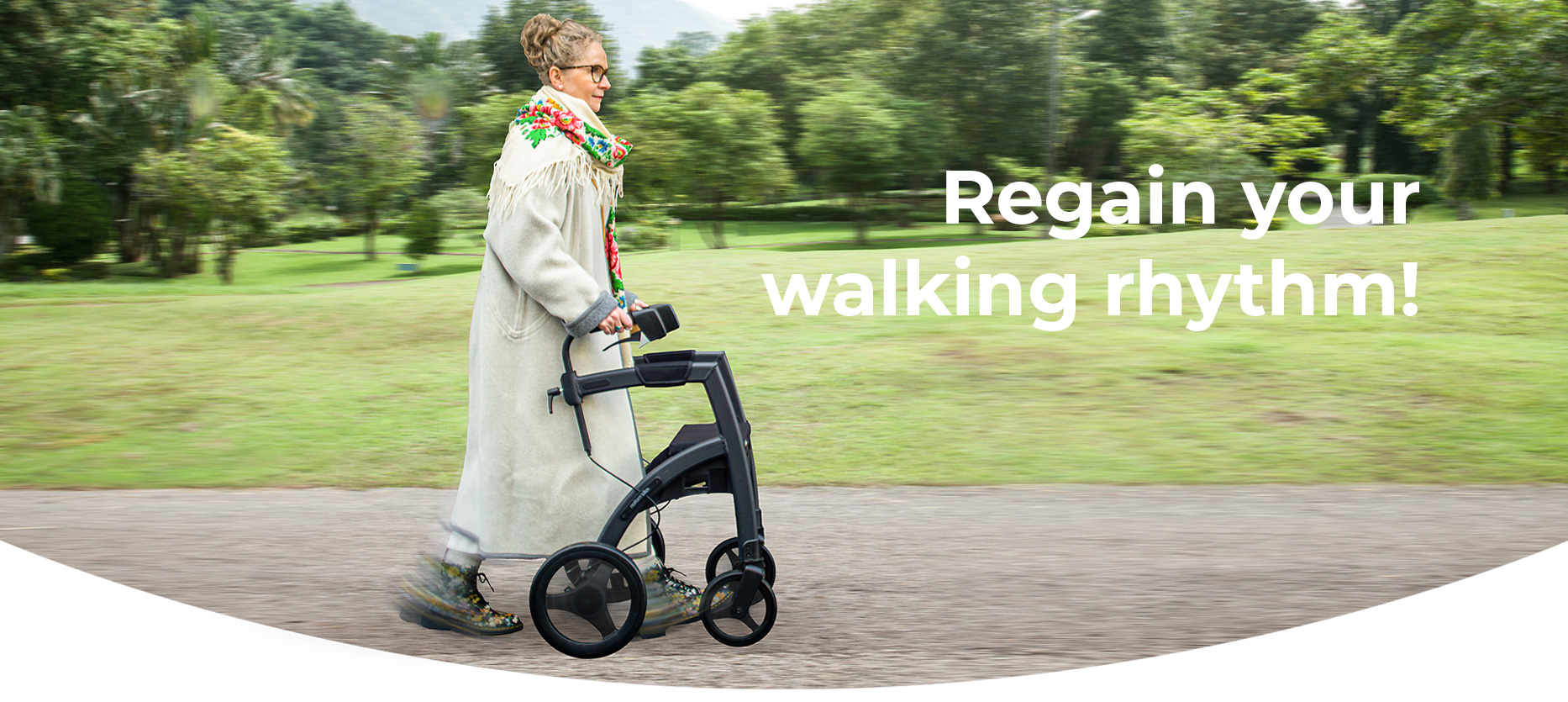 Woman walking with a Parkinson's rollator with adjustable cues