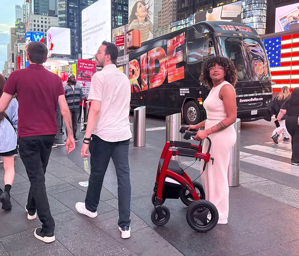 girl walking with an all-terrain rollator walker in New York City