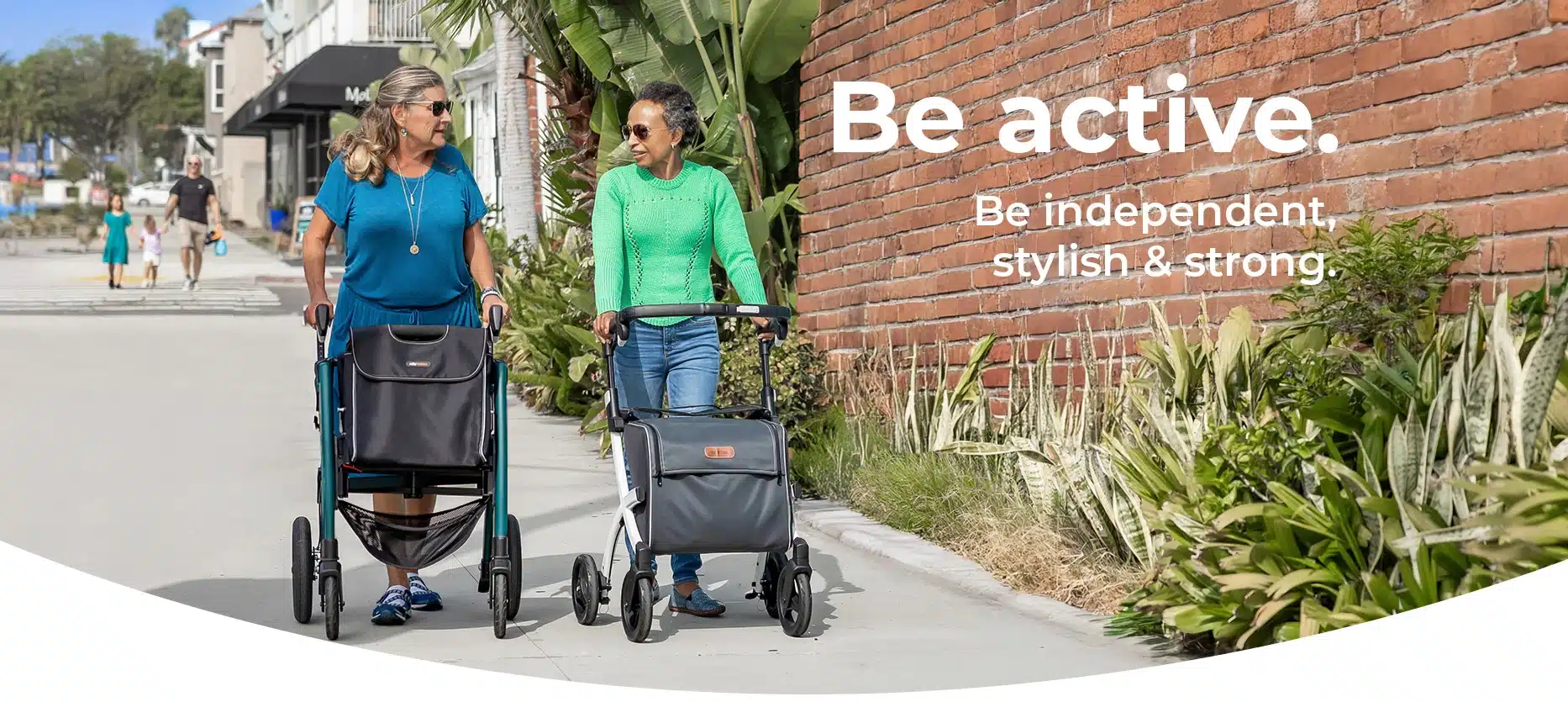 Women walking with Rollz rollators