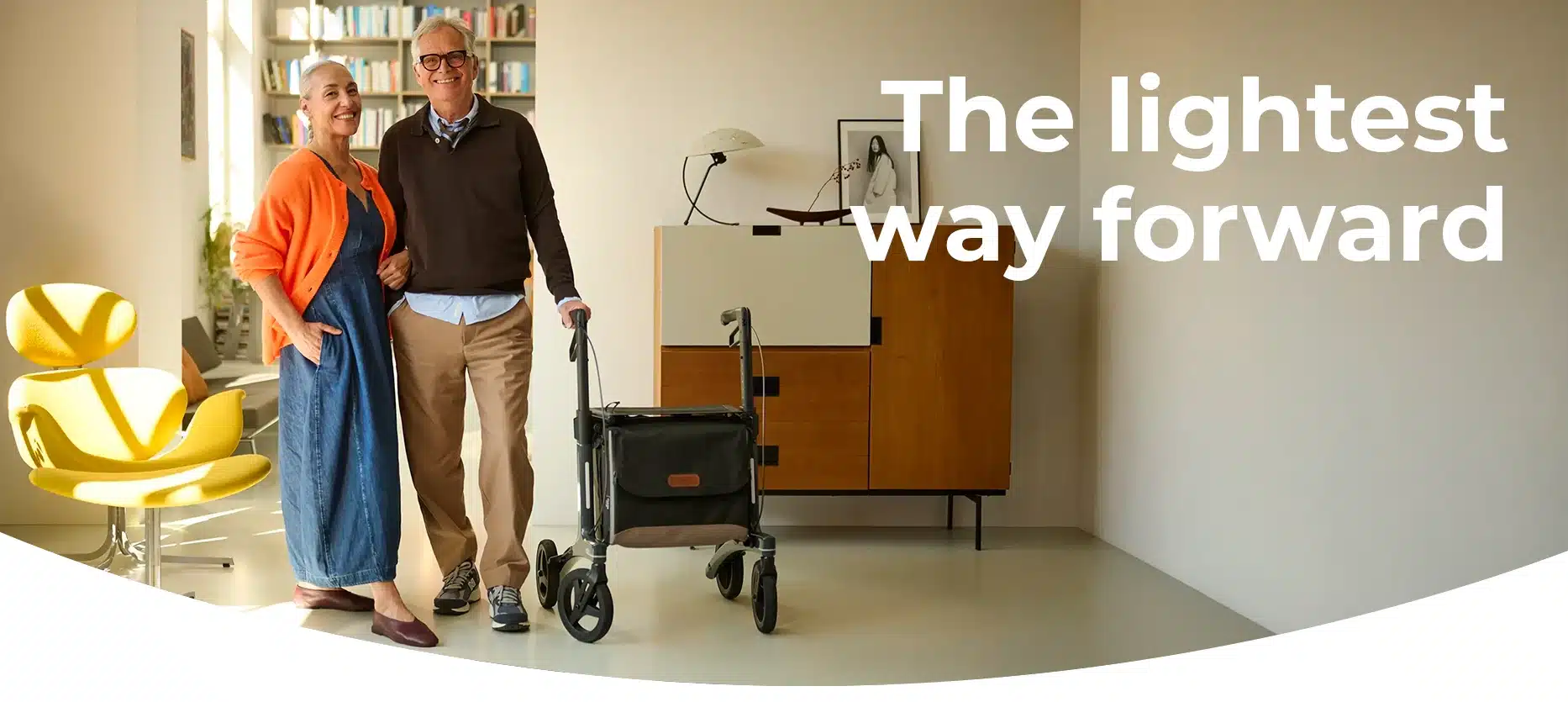 Man using a lightweight rollator in the house